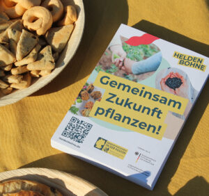 Foto von einem Flyer, auf dem steht: Gemeinsam Zukunft pflanzen"